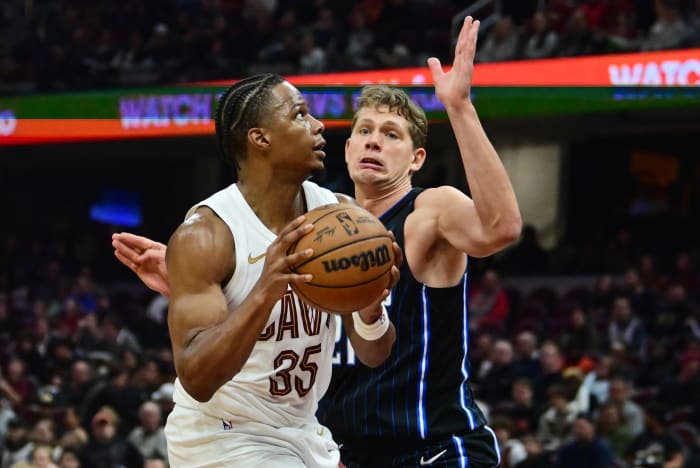 Oct 12, 2023; Cleveland, Ohio, USA; Cleveland Cavaliers forward Isaac Okoro (35) drives to the basket against Orlando Magic center Moritz Wagner (21) during the second half at Rocket Mortgage FieldHouse.